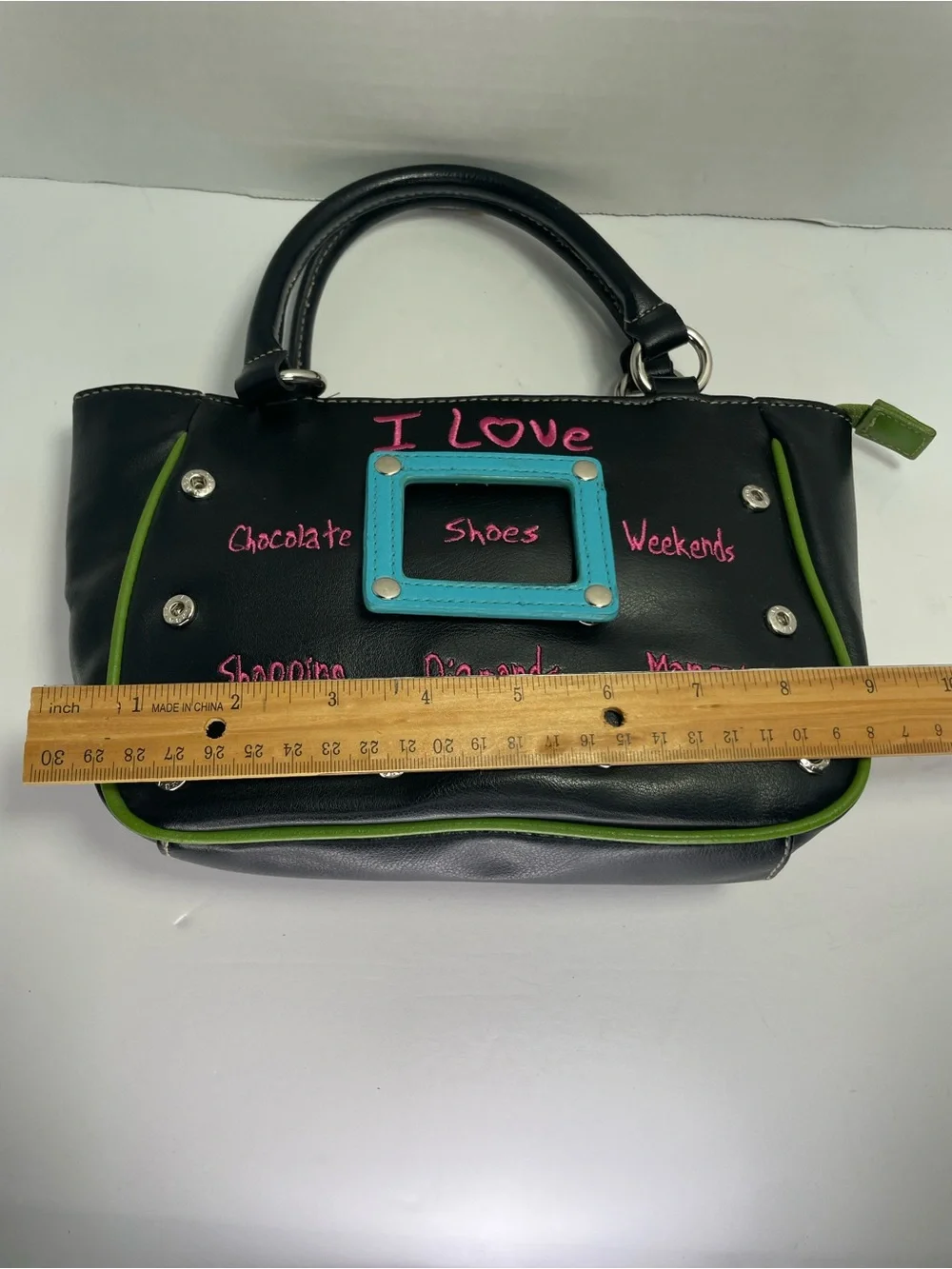 Vintage Y2K-style black faux-leather novelty handbag
